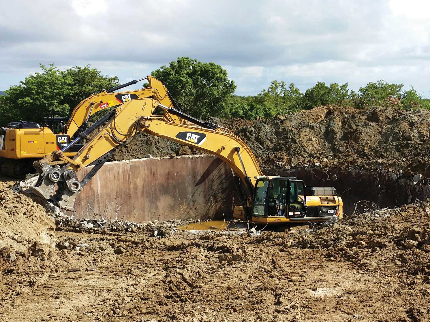 Excavator digging a big hole